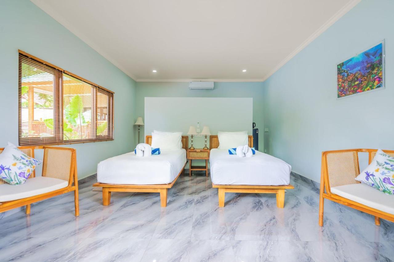 Lunar Dive Resort: Bamboo Villas Kubu Exterior photo